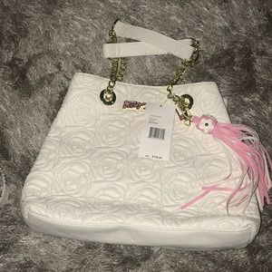 Betsey Johnson “chain shopper rose quilt cream”.